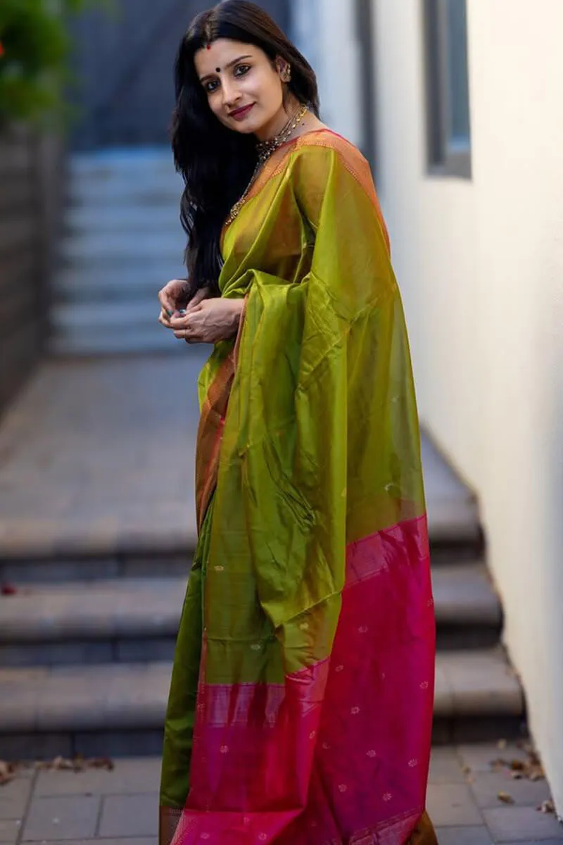 Sizzling Green Soft Silk Saree With Glowing Blouse Piece
