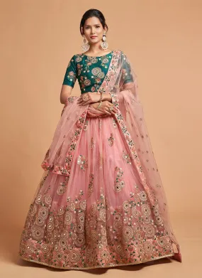 Soft Net Base Peach Color Embroidered Lehenga Choli With Contrast Blouse