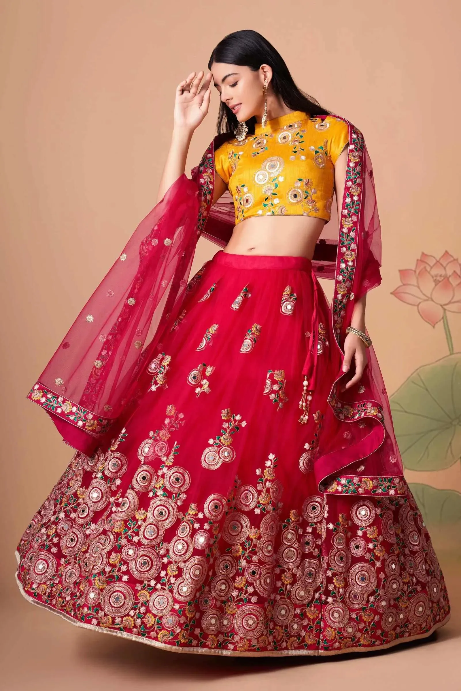 Soft Net Base Peach Color Embroidered Lehenga Choli With Contrast Blouse
