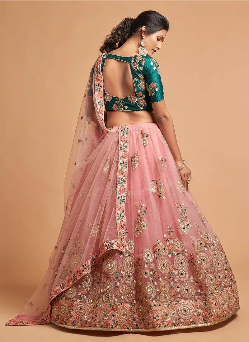 Soft Net Base Peach Color Embroidered Lehenga Choli With Contrast Blouse