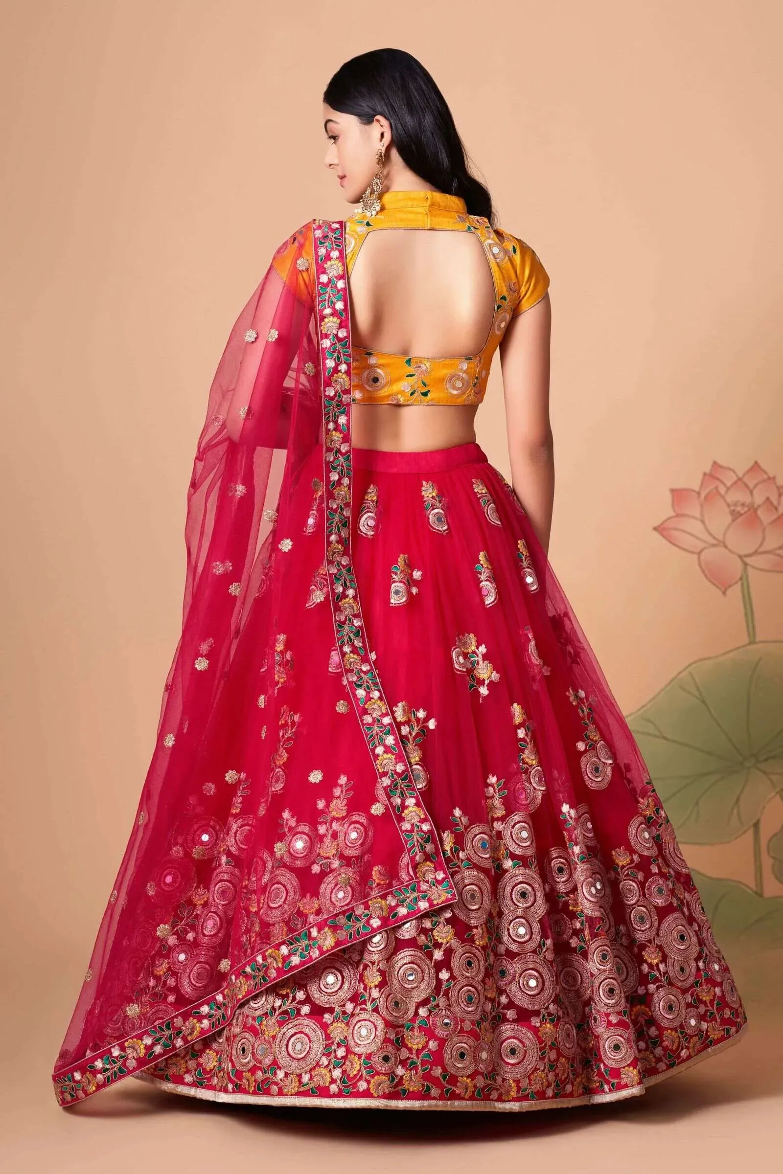 Soft Net Base Peach Color Embroidered Lehenga Choli With Contrast Blouse