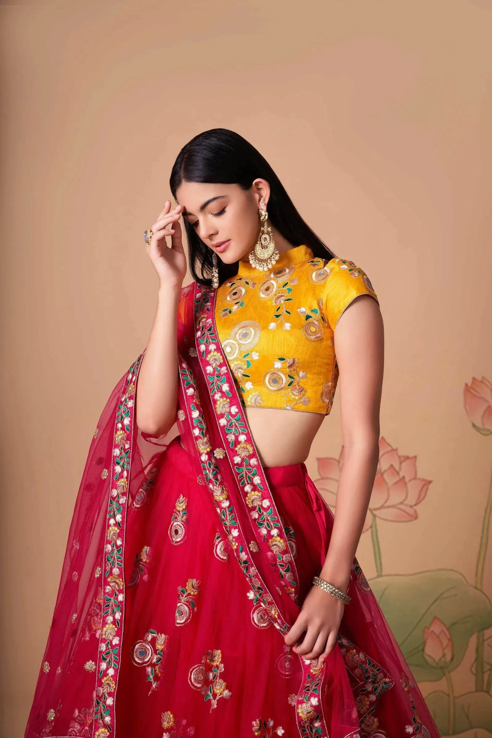 Soft Net Base Peach Color Embroidered Lehenga Choli With Contrast Blouse